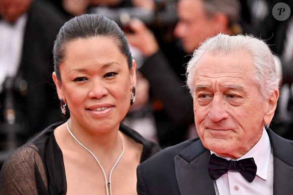 Tiffany Chen, Robert de Niro à la cérémonie d'ouverture du 78ème Festival de Cannes à Cannes, France, le 13 mai 2025. Photo par Julien Reynaud/APS-Medias/ABACAPRESS.COM