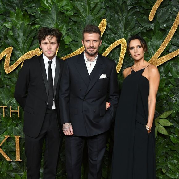 Brooklyn Beckham avec ses parents David Beckham et Victoria Beckham à la soirée British Fashion Awards 2018 au Royal Albert Hall à Londres, le 10 décembre 2018 © Backgrid UK/ Bestimage