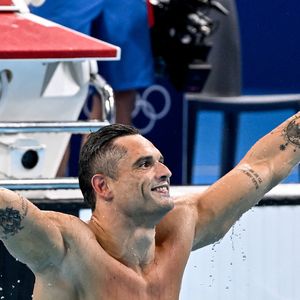 Florent Manaudou of France celebrates after winning the bronze medal in the swimming 50m Freestyle Men Final during the Paris 2024 Olympic Games at La Defense Arena in Paris (France), August 02, 2024.