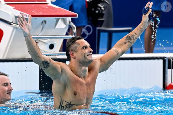 Florent Manaudou of France celebrates after winning the bronze medal in the swimming 50m Freestyle Men Final during the Paris 2024 Olympic Games at La Defense Arena in Paris (France), August 02, 2024.