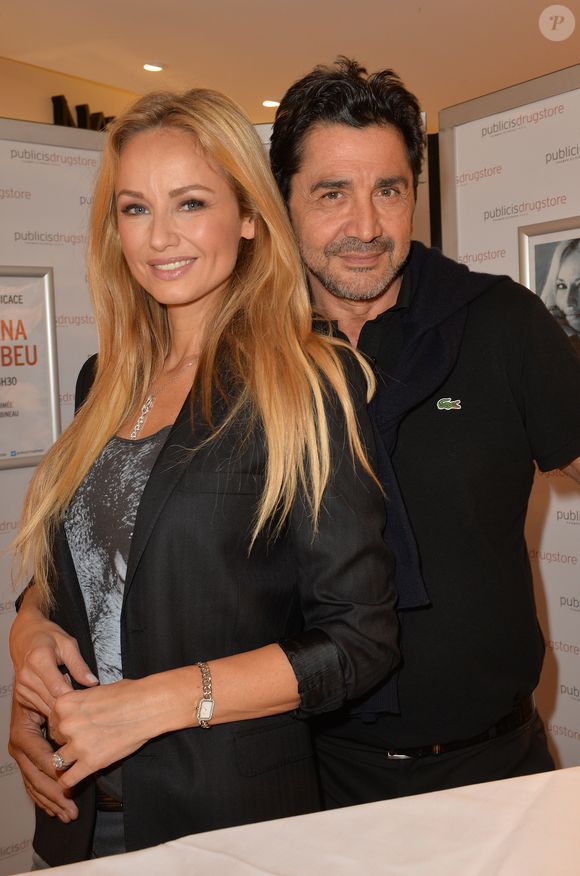 Adriana Karembeu et son mari André (Aram) Ohanian lors de la dédicace de son livre "Je viens d'un pays qui n'existe plus" à la librairie du Publicis Drugstore à Paris, le 25 septembre 2014. Veeren -Christophe Clovis / Bestimage