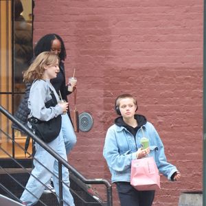 New York, NY  - EXCLUSIVE  - Angelina Jolie's children, Shiloh Nouvel, Vivienne Marcheline, and Zahara Marley Jolie-Pitt, were seen exploring the vibrant streets of Soho. Shiloh sported a blue denim jacket, black pants, and black shoes, while Vivienne opted for a grey sweatshirt, light blue jeans, and white sneakers, complemented by a black sling bag. Zahara completed the trio's stylish appearance with a chic black top, blue jeans, a black belt, and white sneakers.



Pictured: Shiloh Jolie-Pitt, Vivienne Jolie-Pitt, Zahara Marley Jolie