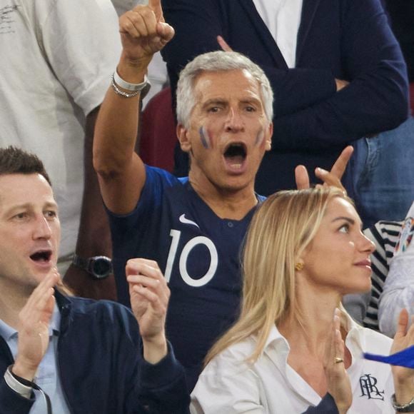 Nagui - Célébrités dans les tribunes du match du groupe D de l'Euro 2024 entre l'équipe de France face à l'Autriche (1-0) à Dusseldorf en Allemagne le 17 juin 2024. © Cyril Moreau/Bestimage