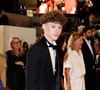 À 14 ans, l’adolescent a posé devant les photographes lors de l’avant-première de "Karma".

Marcel Canet - Descente des marches du film « Karma » lors du 79ème Festival International du Film de Cannes, le 15 mai 2026. © Jacovides-Moreau / Bestimage