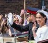 A en croire les confidences de Katie Nicholl, célèbre biographe de la famille royale britannique, parues dans Page Six, la maman d'Archie et Lilibet aurait "réprimandé" l'un de ses traiteurs
Le prince Harry, duc de Sussex, et Meghan Markle, duchesse de Sussex, en calèche à la sortie du château de Windsor après leur mariage le 19 mai 2018 © Alain Rolland / Imagebuzz / Bestimage