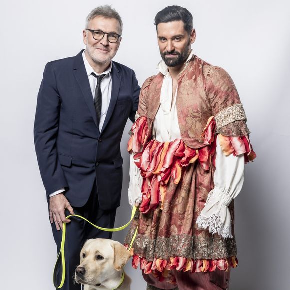 Hugo Manos et l'animateur de 62 ans ont notamment un "très bon relationnel" pour gérer la garde de Tigane, leur labrador de deux ans, qu'ils se partagent. 

Exclusif - Laurent Ruquier, son compagnon Hugo Skliris (Manos) et leur chien Titi - Studio - Enregistrement de l'émission "La chanson secrète", présentée par N.Aliagas et diffusée le 29 décembre sur TF1
© Guillaume Gaffiot-Cyril Moreau / Bestimage