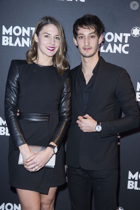 Pierre Niney et sa compagne Natasha Andrews à l'inauguration du nouveau concept de boutique Montblanc réalisé par le designer Noé Duchaufour-Lawrance, au 12 Boulevard des Capucines à Paris, le 14 janvier 2016. Crédit Olivier Borde/Bestimage