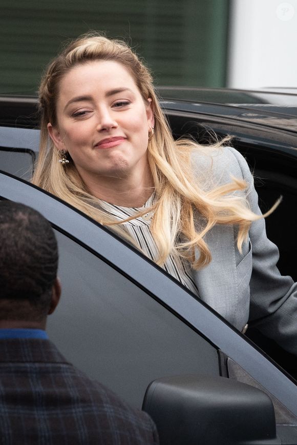 Amber Heard quitte le tribunal du comté de Fairfax, à Fairfax, à la fin du procès civil qui l'oppose à Johnny Depp, vendredi 27 mai 2022. Photo par Cliff Owen/CNP/ABACAPRESS.COM