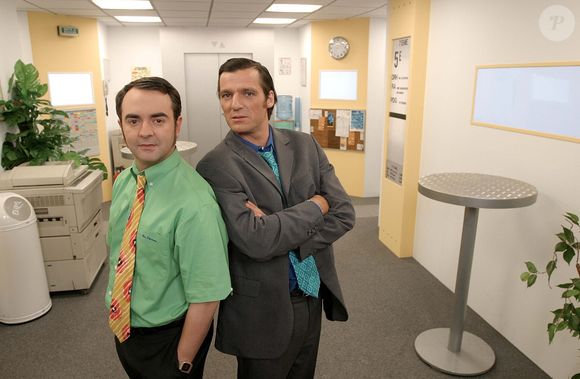 Bruno Solo et Yvan Le Bolloc'h dans "Caméra Café" en 2003.

Photo : JLPPA / Bestimage