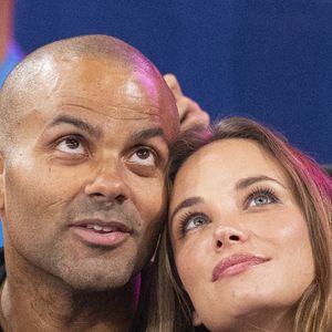 Tony Parker avec son fils Josh et sa compagne Agathe Teyssier - Célébrités assistent à la victoire de Teddy Riner sacré champion Olympique aux épreuves de judo +100KG lors des Jeux Olympiques de Paris 2024 (JO) au Arena Champs de Mars à Paris le 2 aout 2024. © Perusseau-Jacovides/Bestimage