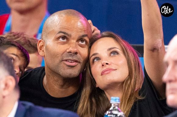 Tony Parker avec son fils Josh et sa compagne Agathe Teyssier - Célébrités assistent à la victoire de Teddy Riner sacré champion Olympique aux épreuves de judo +100KG lors des Jeux Olympiques de Paris 2024 (JO) au Arena Champs de Mars à Paris le 2 aout 2024. © Perusseau-Jacovides/Bestimage
