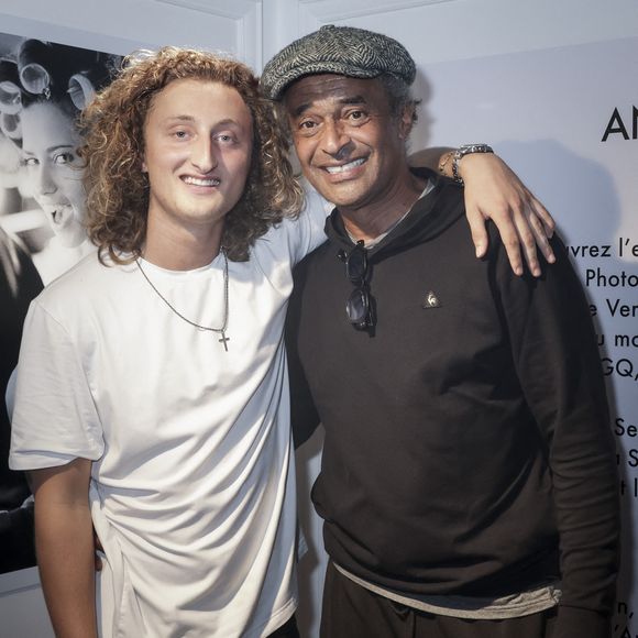 Joalukas Noah et son père Yannick Noah - Isabelle Camus a organisé pour son ami photographe Antoine Verglas, le vernissage de l'exposition éphémère de ses photographies à la Galerie La Hune en partenariat avec YellowKorner le 4 juillet 2023.  © Jack Tribeca/Bestimage