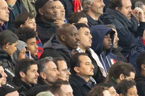 Jean-Pascal Zadi - Célébrités dans les tribunes lors du match retour de la Ligue Des Champions 2024-2025 (LDC) "PSG - Arsenal" (2-1) au Parc des Princes à Paris le 7 mai 2025. © Cyril Moreau/Bestimage