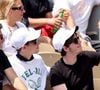 Sur cette photo, prise dans les studios d'Universal à Hollywood, on voit l'interprète de "Qui a le droit" poser sur une moto side-car, aux côtés d'Oscar et Léon, qui sont ses parfaits sosies !

Patrick Bruel et ses fils Léon et Oscar dans les tribunes des Internationaux de France de tennis de Roland Garros 2024 à Paris, France, le 4 juin 2024. © Jacovides-Moreau/Bestimage