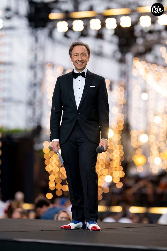 Avec humour, il a conclu : "En période de disette budgétaire, je ne crois pas qu’on me fasse tourner… en bourrique."

Stéphane Bern lors de la 13ème édition du Concert de Paris aux pieds de la Tour Eiffel à l’occasion de la fête nationale du 14 juillet proposé par Radio France, France Télévisions, la Ville de Paris, et Électron Libre Productions.

© Perusseau / Clovis / Bestimage