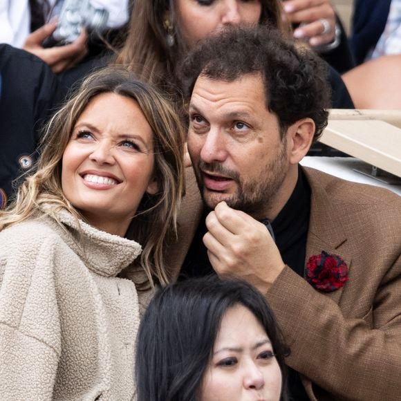 Éric Antoine et sa compagne Gennifer Demey en tribunes lors des Internationaux de France de Tennis de Roland Garros 2025, à Paris, France, le 7 juin 2025. © Cyril Moreau/Bestimage