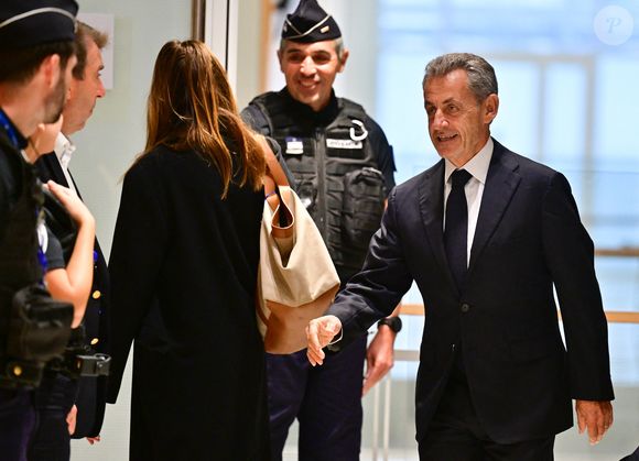 Nicolas Sarkozy et sa femme Carla Bruni au Tribunal judiciaire (Batignolles, 32ème chambre correctionnelle) pour l'annonce de la décision dans le cadre du procès Lybien le 25 septembre 2025.

© Christian Liewig / Bestimage