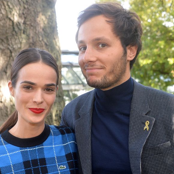 Vianney Bureau (Vianney), sa compagne Catherine Robert - People au défilé Lacoste Collection Prêt-à-Porter Printemps/Eté 2020 lors de la Fashion Week de Paris, le 1er octobre 2019. © Veeren Ramsamy-Christophe Clovis/Bestimage