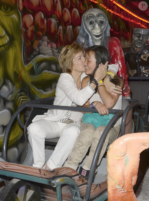 Véronique Jannot et sa fille adoptive Migmar - Inauguration de la Fête des Tuileries à Paris le 26 juin 2015.

©BestImage