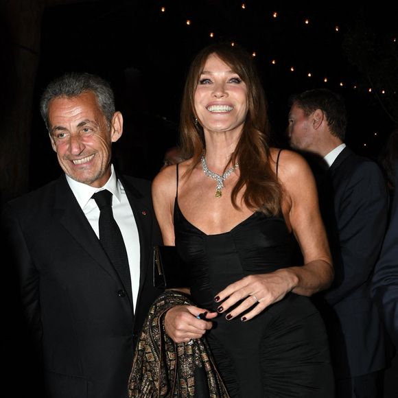 Carla Bruni et son mari Nicolas Sarkozy à la soirée "Women In Motion" par Kering au Château de la Castre lors du 75ème Festival International du Film de Cannes, le 22 mai 2022.