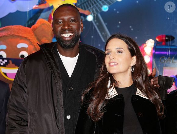 Omar Sy et sa femme Hélène - Lancement de "1,2,3... Noël" lors de l'inauguration des vitrines et du sapin de Noël 2021 des Galeries Lafayette Haussmann 2021 à Paris. Le 17 novembre 2021. © Panoramic / Bestimage