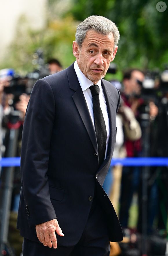 Le Ministre d'État, ministre de l'Intérieur, et l'ancien président de la République Nicolas Sarkozy lors d'une cérémonie en l'hommage à Aurélie Fouquet, la policière municipale de 26 ans avait été tuée lors de l'attaque d'un fourgon blindé le 20 mai 2010, à Villiers-sur-Marne (en banlieue parisienne), Val-de-Marne, France, le 20 mai 2025. © Christian Liewg/Bestimage