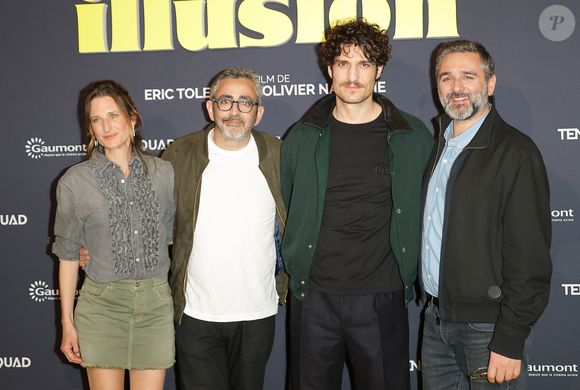 Louis Garrel est actuellement à l'affiche du nouveau film du duo Toledano/Nakache, "Juste une illusion", dont l'intrigue se déroule dans les années 80. 


Camille Cottin, Eric Toledano, Louis Garrel et Olivier Nakache à la première du film "Juste une illusion" au cinéma Le Grand Rex à Paris le 22 mars 2026. © Coadic Guirec/Bestimage