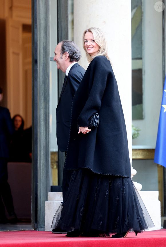 Xavier Niel et sa compagne Delphine Arnault, Pdg de la maison Dior - Arrivées au dîner d'état au palais de l'Elysée à Paris donné en l'honneur du roi et de la reine de Danemark le 31 mars 2025.

© Jacovides / Moreau / Bestimage