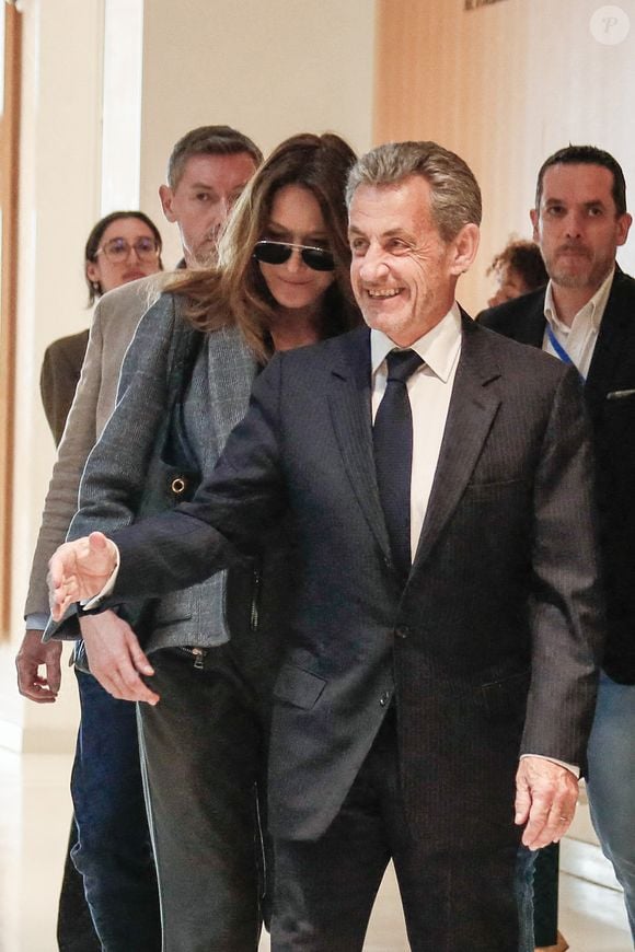 Nicolas Sarkozy et sa femme Carla Bruni - Dernier jour du procès du financement libyen de Sarkozy: ses avocats de l’ancien président vont plaider la relaxe, au tribunal de Paris, France, le 8 avril 2025. © Christophe Clovis/Bestimage