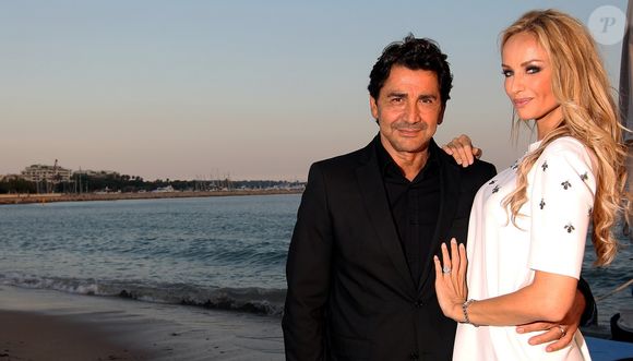 Adriana Karembeu et son mari André Aram Ohanian - Adriana est l'invitée d'honneur de la soirée caritative pour soutenir les associations RMC/BFM et Rayon de Soleil de Cannes, à l'occasion des 10 ans de la Plage Z du Grand Hyatt Hotel Martinez à Cannes le 27 juin 2014. Patrice Lapoirie / Nice Matin / Bestimage