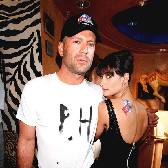 Bruce Willis et sa femme Demi Moore à l'ouverture du Planet Hollywood à Beverly Hills à Los Angeles, CA, USa en 1995. Photo by Startraks/ABACAPRESS.COM