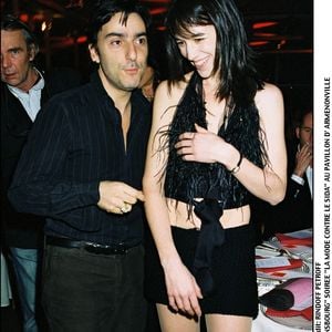 Archives : Charlotte Gainsbourg et Yvan Attal au pavillon d'Armenonville. Photo par BERTRAND RINDOFF PETROFF / BESTIMAGE