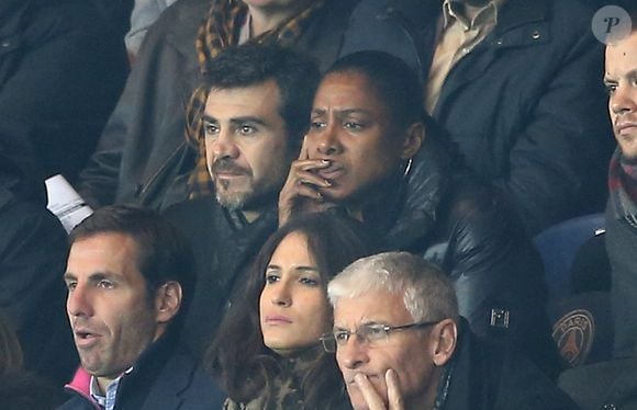 Sébastien Foucras (ski acrobatique) et sa compagne Marie-José Pérec (athlétisme) - People au match de ligue des champions Psg - Real de Madrid au Parc des Princes à Paris le 21 octobre 2015.