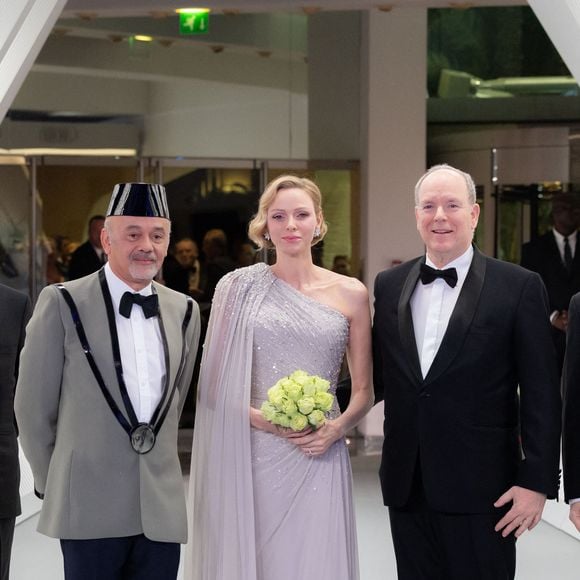 Christian Louboutin, TT.SS.HH. Le prince Albert II (Le prince Albert II de Monaco) et la princesse Charlène de Monaco (La princesse Charlène de Monaco) assistent à la 70e édition du Bal de la Rose au Sporting Club de Monte-Carlo à Monaco, le 21 mars 2026.  © Olivier Huitel/Pool Monaco/Bestimage