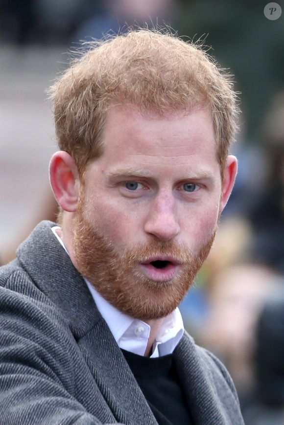 Le prince Harry, duc de Sussex,  et Meghan Markle, duchesse de Sussex,  enceinte, lors d'une visite à Birkenhead le 14 janvier 2019. Backgrid USA / Bestimage