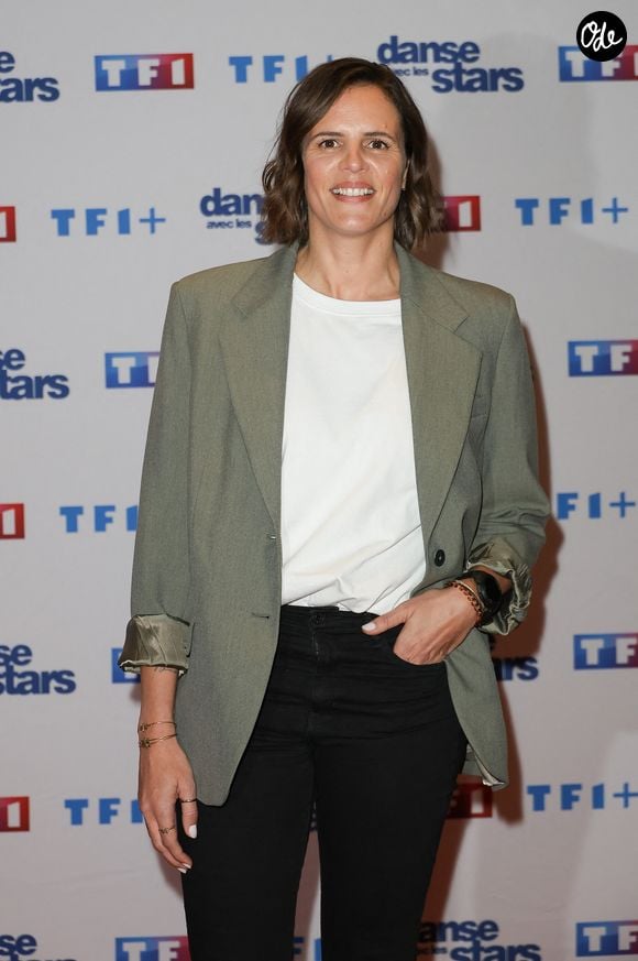 Sa sœur Laure Manaudou a, elle aussi, été impressionnée par la prestation de la chanteuse canadienne.

Laure Manaudou - Photocall de lancement de la saison 2026 de "Danse avec les stars" (DALS) au siège de TF1 à Boulogne-Billancourt le 18 décembre 2025. © Coadic Guirec/Bestimage