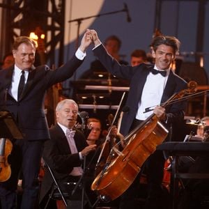 Renaud Capuçon, Gautier Capuçon - "Concert de Paris" sur le parvis de l'hôtel de ville de Paris retransmis en direct sur France 2 et sur France Inter, Paris le 14 juillet 2024. © Christophe Clovis - Pierre Perusseau / Bestimage