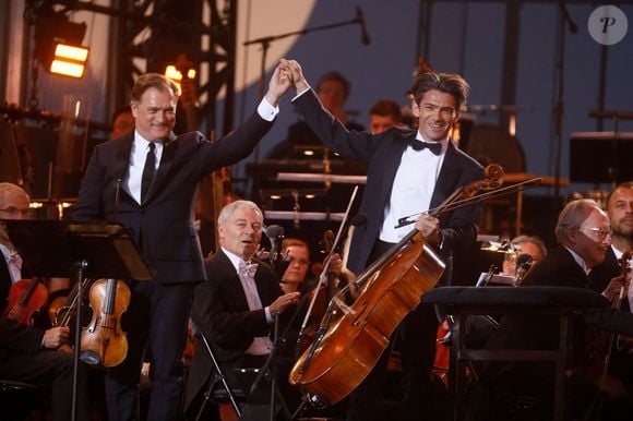 Renaud Capuçon, Gautier Capuçon - "Concert de Paris" sur le parvis de l'hôtel de ville de Paris retransmis en direct sur France 2 et sur France Inter, Paris le 14 juillet 2024. © Christophe Clovis - Pierre Perusseau / Bestimage