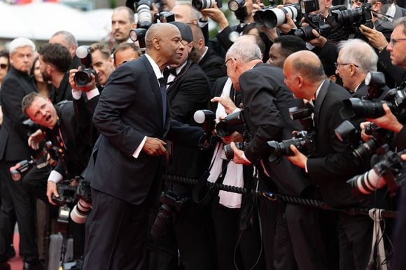 Lundi 19 mai 2025, la légende vivante du cinéma hollywoodien était présente sur la Croisette aux côtés du réalisateur Spike Lee

Denzel Washington - Montée des marches du film « Highest 2 Lowest  » lors du 78ème Festival International du Film de Cannes, au Palais des Festivals à Cannes. Le 19 mai 2025
© Olivier Borde/ Bestimage