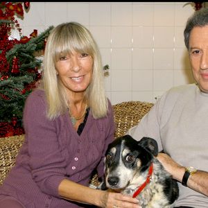 Michel Drucker et Dany Saval.  avec leur nouveau chien TOMMY adoptÈ par MICHEL DRUCKER lors du Noel des animaux de la S.P.A au palais des sports Marcel Cerdan. Guillaume Gaffiot/Bestimage