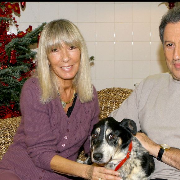 Michel Drucker et Dany Saval.  avec leur nouveau chien TOMMY adoptÈ par MICHEL DRUCKER lors du Noel des animaux de la S.P.A au palais des sports Marcel Cerdan. Guillaume Gaffiot/Bestimage