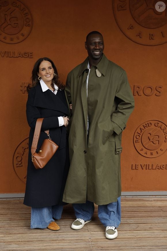 Omar Sy et sa femme Hélène lors des Internationaux de France de Tennis de Roland Garros 2025, à Paris, France, le 7 juin 2025.

© Cyril Moreau / Bestimage