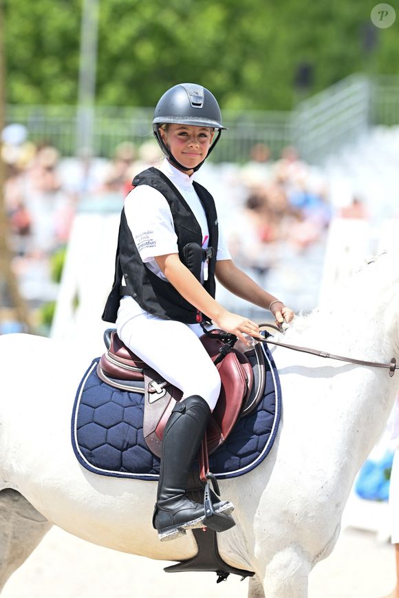 Giulia Sarkozy sur Valentine lors de la coupe Kids Cup L'Envol lors du Longines Paris Eiffel Jumping le 20 juin 2025

Perusseau / Veeren / Bestimage