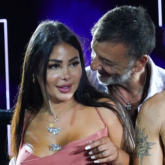 Maeva Ghennam et Marco Mouly en compagnie du boxeur Yuri Mamedov (France) lors du gala de boxe Prestige Fight au palais des Festivals à Cannes le 15 août 2022.

Photo par Norbert Scanella / Panoramic / Bestimage