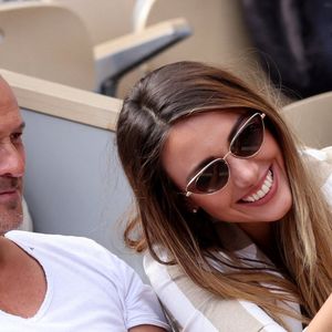 Roger Erhart et sa compagne Delphine Wespiser, Miss France 2012 - Célébrités dans les tribunes des internationaux de France de Roland Garros à Paris le 31 mai 2022. © Cyril Moreau - Dominique Jacovides/Bestimage