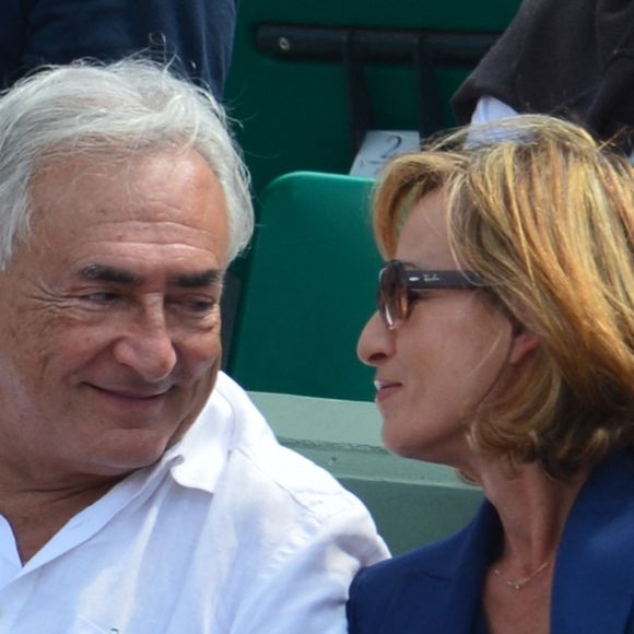 Dominique Strauss-Kahn et sa compagne Myriam L'Aouffir assistent à la finale féminine Serena Williams vs Maria Sharapova lors des Internationaux de France de Tennis 2013 au stade Roland-Garros à Paris, France le 8 juin 2013. Williams a gagné 6-4, 6-4. Photo Christophe Guibbaud/ABACAPRESS.COM