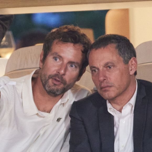 François Roelants et son mari Marc-Olivier Fogiel - Personnalités dans les tribunes lors des Internationaux de France de tennis de Roland Garros 2024 à Paris. Le 29 mai 2024
© Jacovides-Moreau / Bestimage