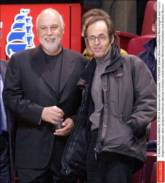 Le mari de Céline Dion, René Angelil, et le chanteur/compositeur français Jean-Jacques Goldman assistent à un match de hockey entre les Canadiens de Montréal et les Bruins de Boston. le 17 octobre 2000 © André Pichette/ABACA