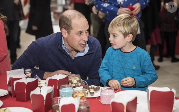 Les enfants du couple formé par Kate Middleton et le prince William étaient au coeur de cette harmonie...

Le duc de Cambridge discute avec Harry O'Grady, cinq ans, au palais de Kensington, à Londres, où il organise une fête de Noël pour les familles et les enfants du personnel déployé de RAF Coningsby et RAF Marham en service à Chypre. Londres, Royaume-Uni, mardi 4 décembre 2018. Photo Richard Pohle/The Times/PA Wire/ABACAPRESS.COM