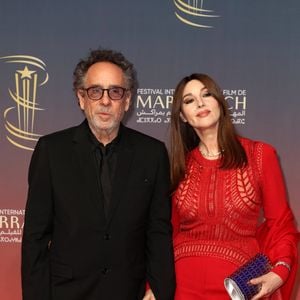 Tim Burton, Monica Bellucci au photocall de la cérémonie d'hommage à Sean Penn lors de la deuxième journée du 21e Festival international du film de Marrakech, le 30 novembre 2024 à Marrakech, Maroc. © Dominique Jacovides/Bestimage